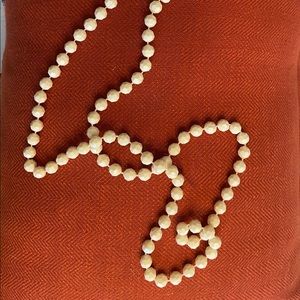 Long, pearl like, vintage costume necklace